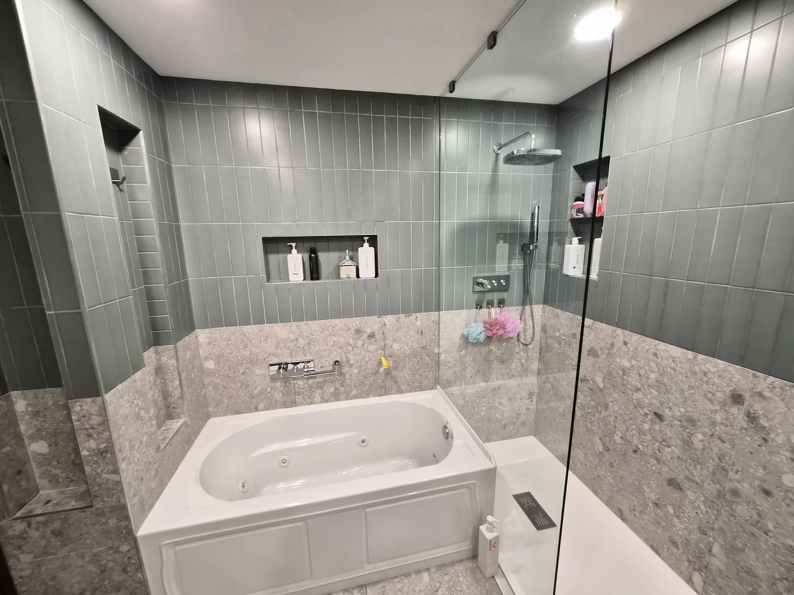 Modern bathroom remodel with a walk-in shower